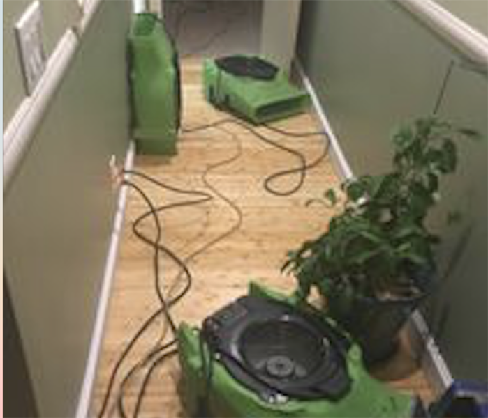 Drying equipment in hallway.