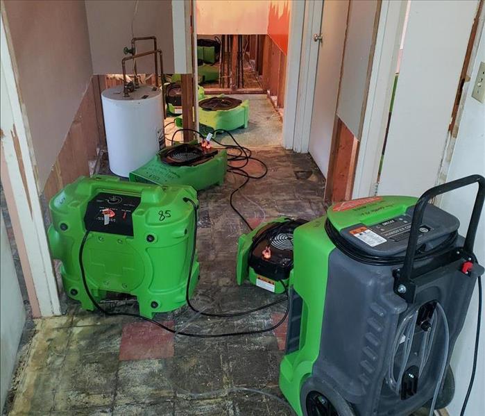 Drying equipment on floor.