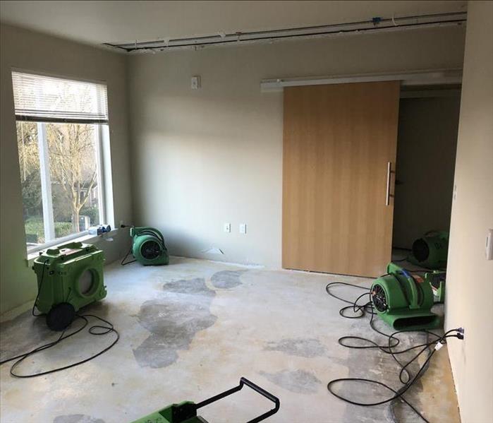 Drying equipment in an empty room.