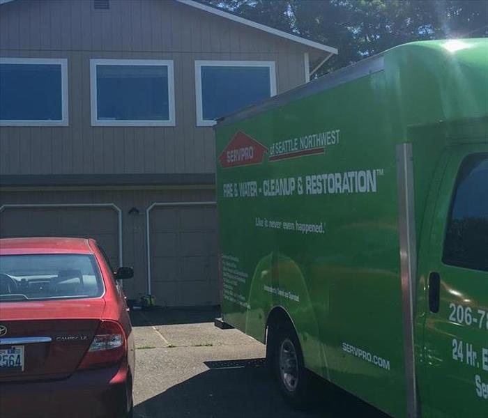 SERVPRO van parked outside loss.