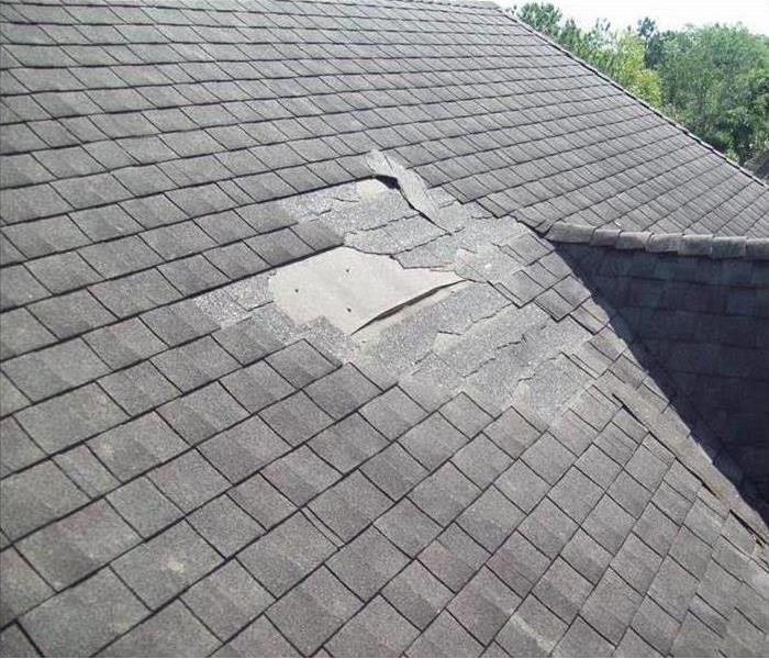 Damaged roof cause by storm
